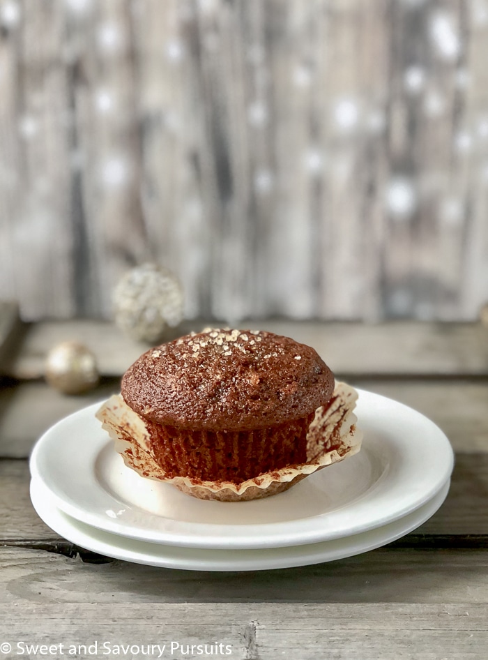 Gingerbread muffin on dish.