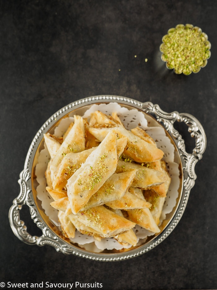 Dish of walnut Baklava rolls.