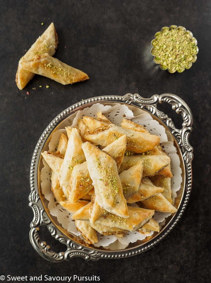 Dish of walnut stuffed rolled Baklava.