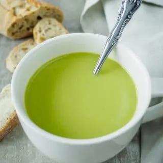 Mug of creamy asparagus soup