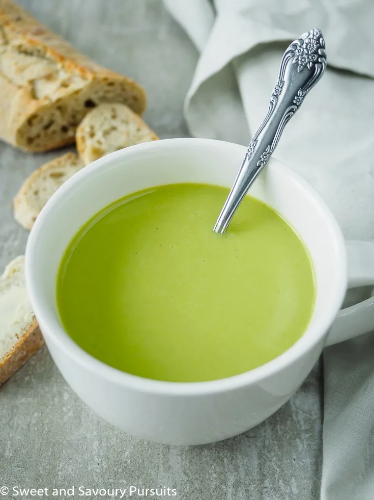 Mug of creamy asparagus soup