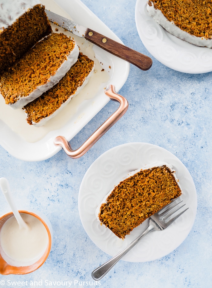 Top view of a Healthy Carrot Bread sliced and served on a small dish.