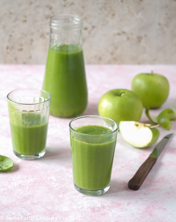 Pineapple Spinach Smoothie served into small glasses