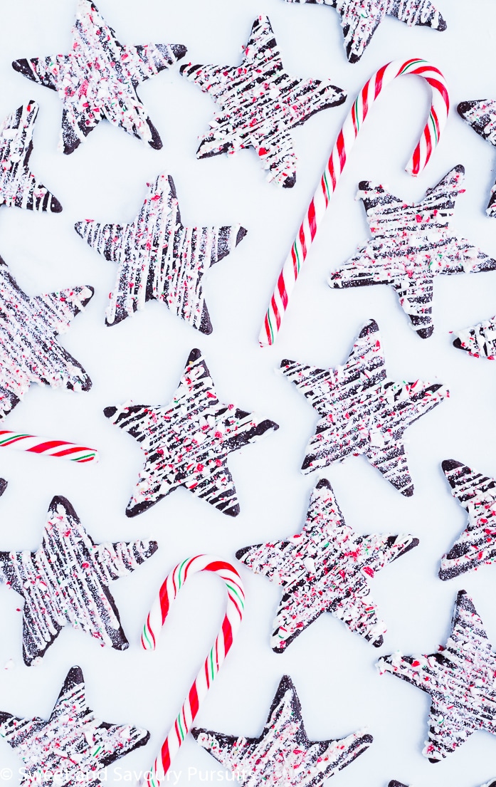 Chocolate Peppermint Sugar Cookies drizzled with white chocolate and spinkled with crushed candy canes.