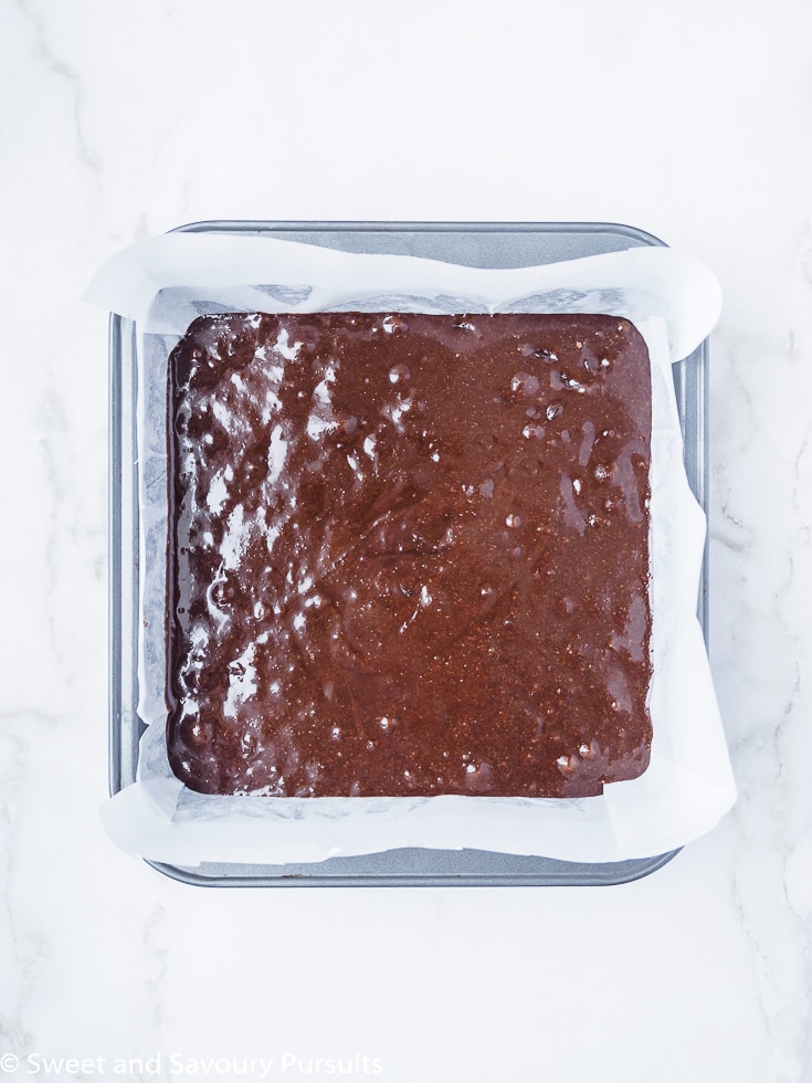 Tray of unbaked brownies.