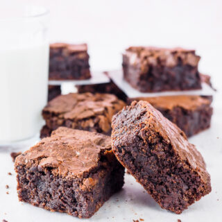 Sliced Gluten-Free Almond Flour Brownies with glass of milk.