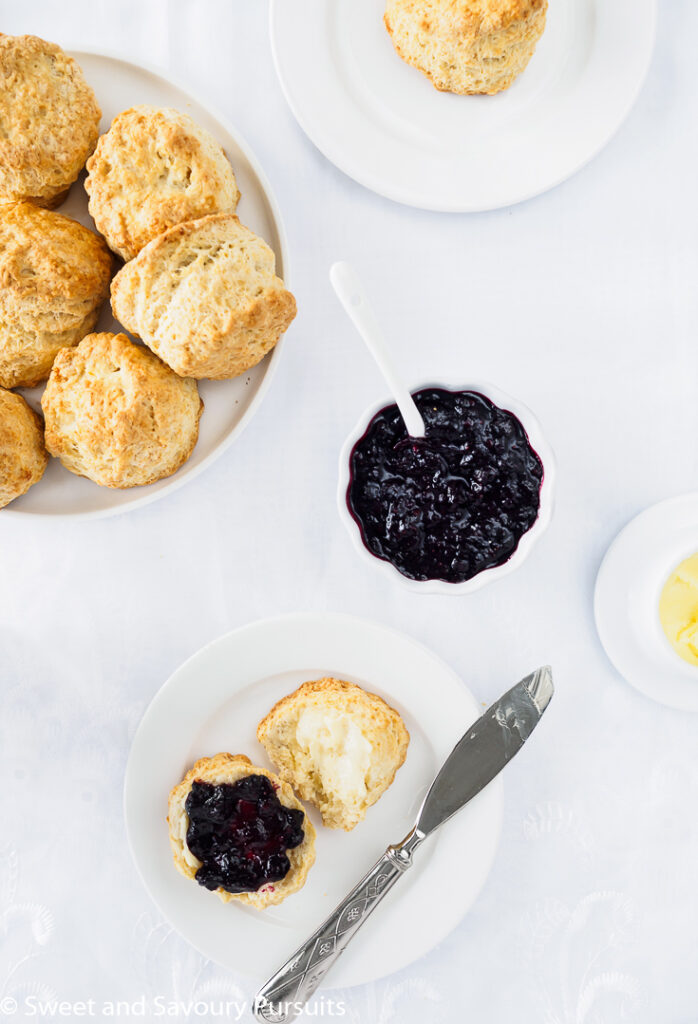Dish or Irish Scones served with butter and a homemade mixed berry jam