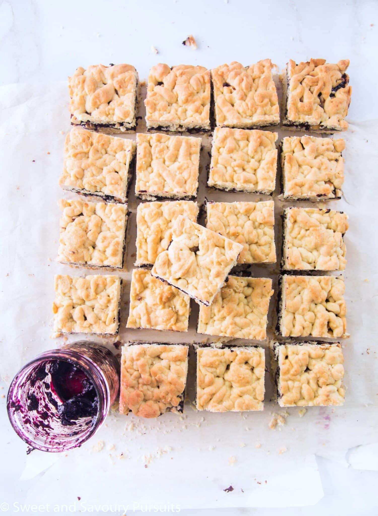 Top view of blueberry jam and hazelnuts bars.