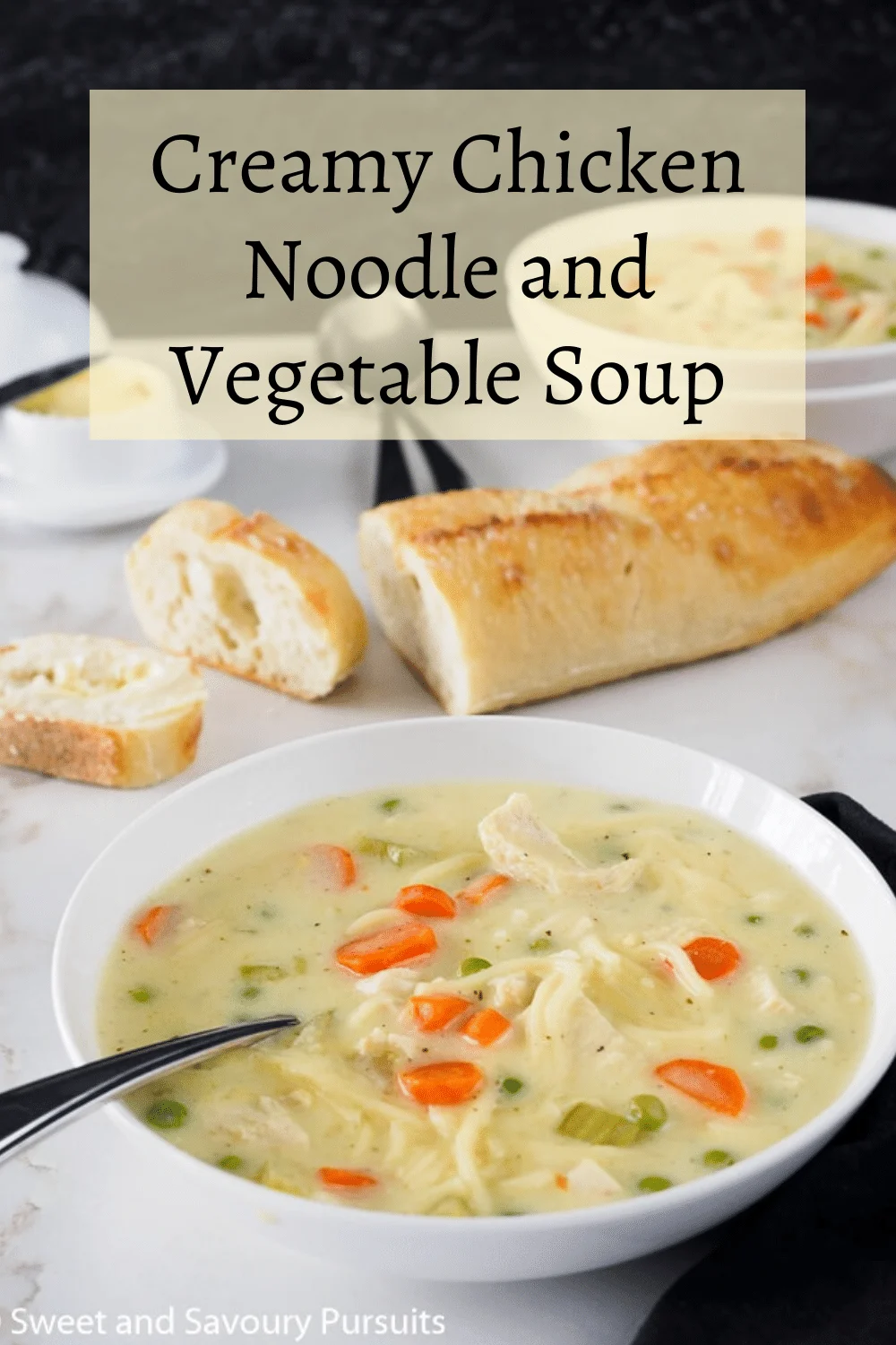 Bowl of creamy chicken noodle and veggie Soup.