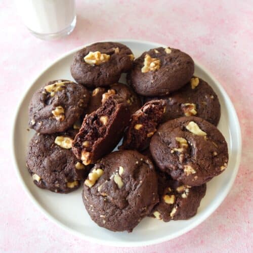 Close up of a plate of Fudgy Chocolate Walnut Cookies