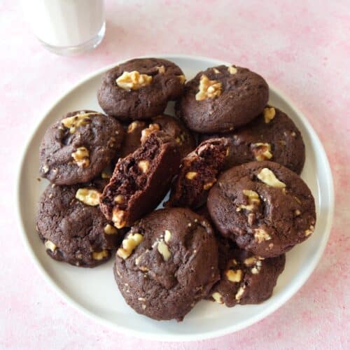 Close up of a plate of Fudgy Chocolate Walnut Cookies