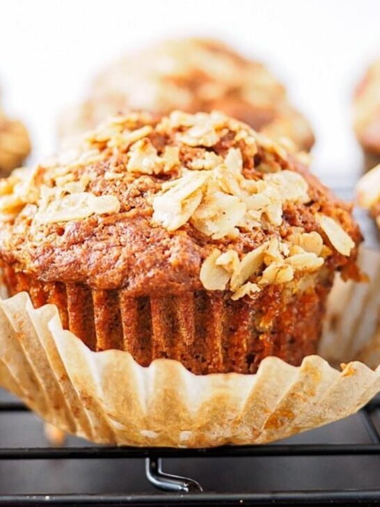 Whole wheat carrot muffins on cooling rack.