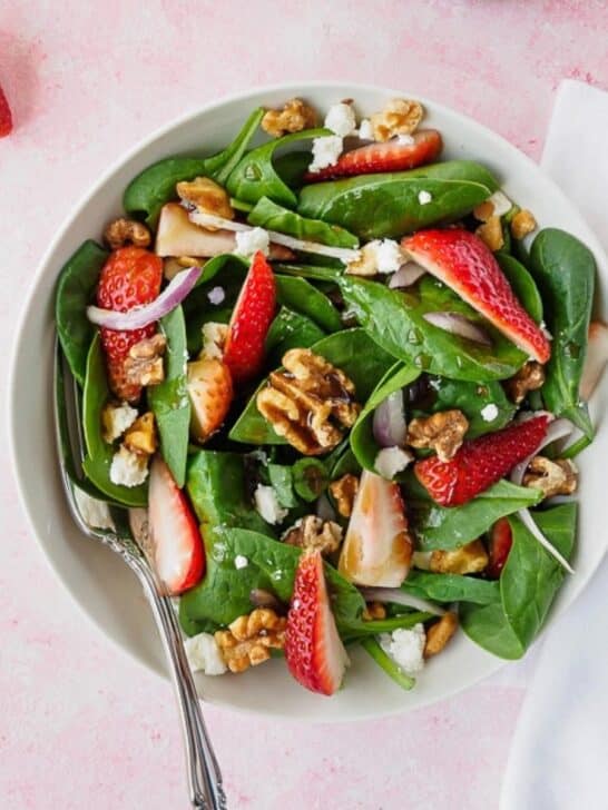 Bowl of strawberry spinach salad.