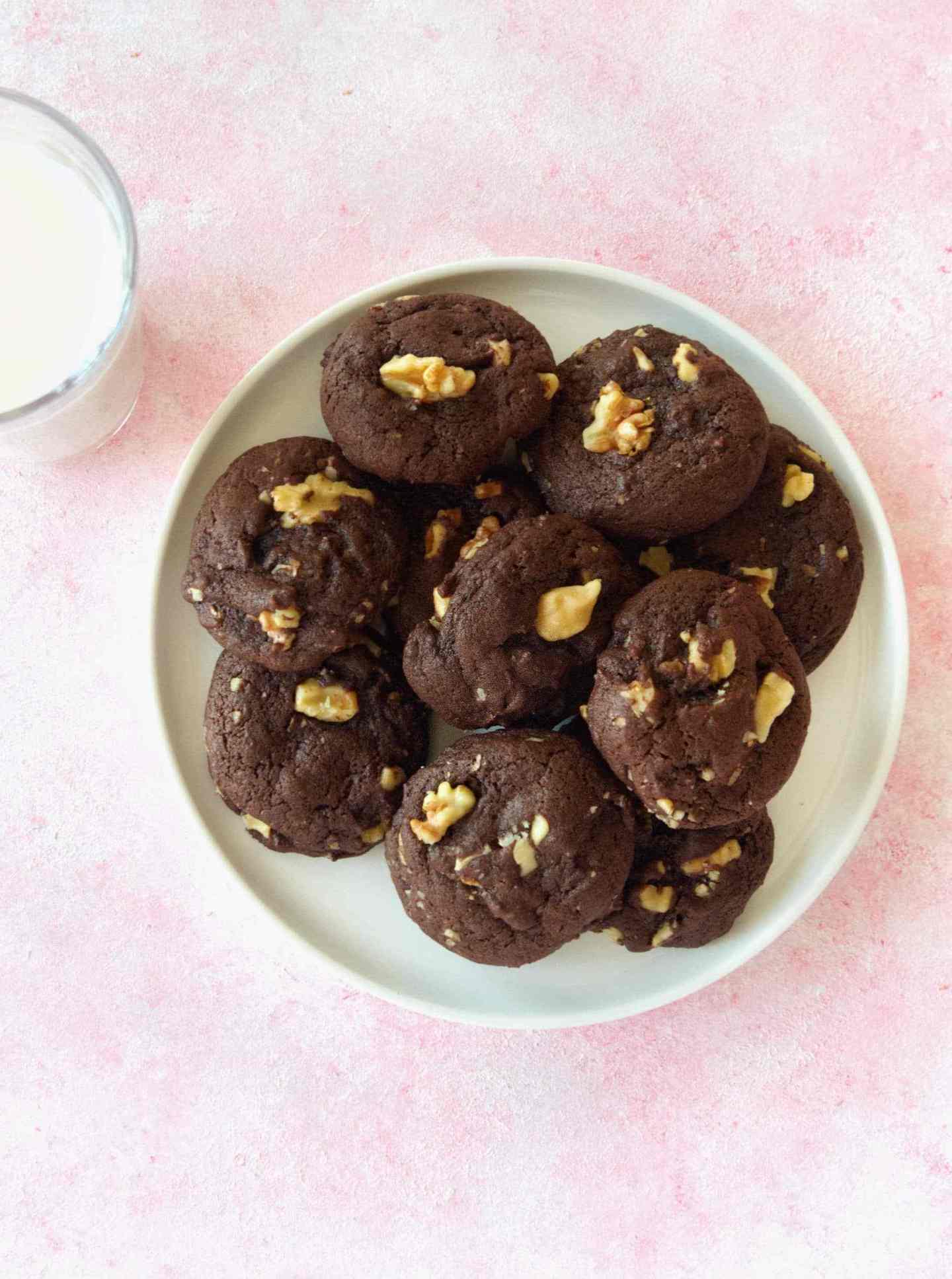 Chocolate Walnut Cookies on dish served with milk.