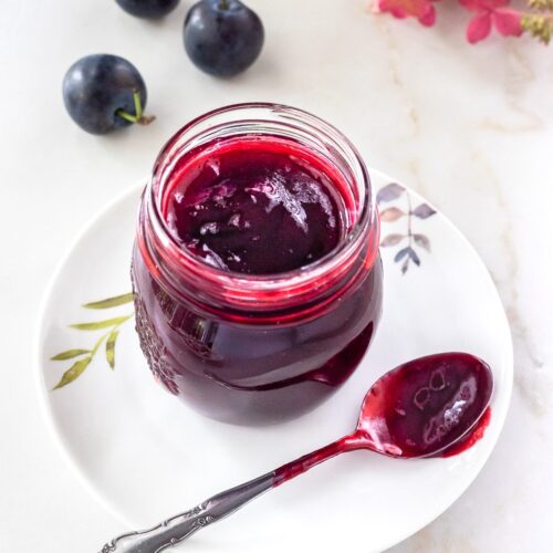 Jar of homemade plum jam.