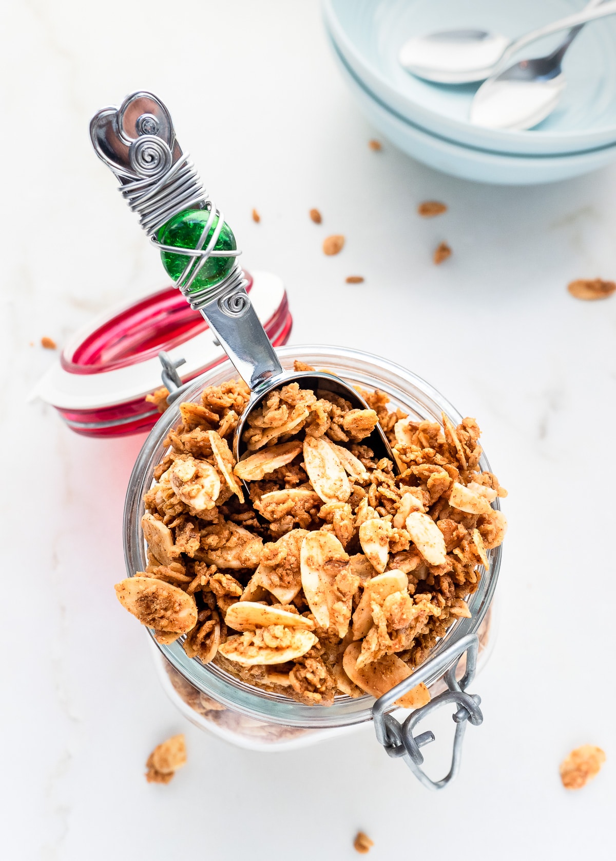 Top view of mason jar filled with homemade vanilla almond granola.