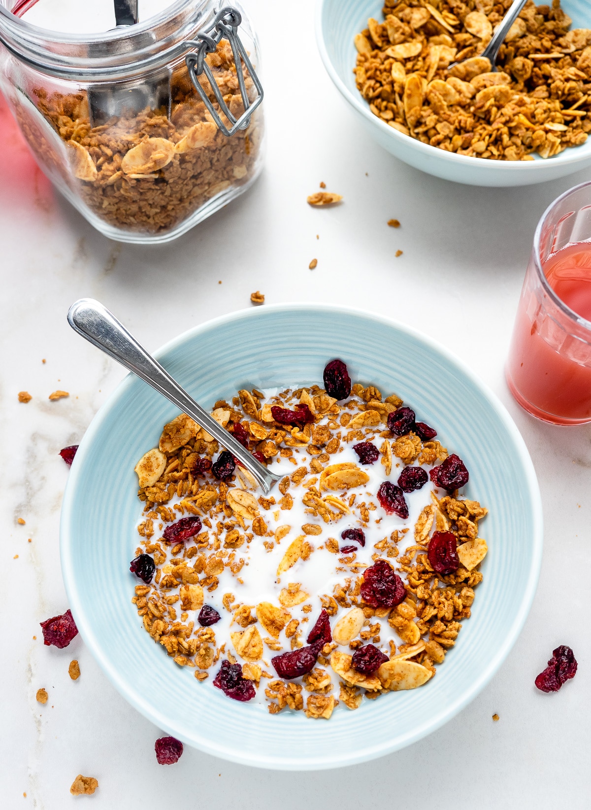 Bowl of French vanilla almond granola with milk.