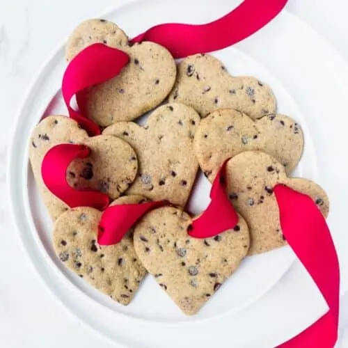 Plate of heart shaped cookies.