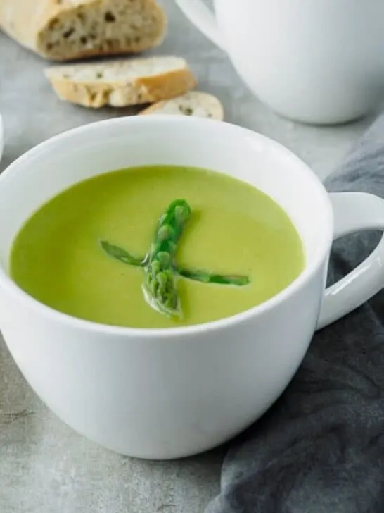 Large mug of creamy asparagus soup.