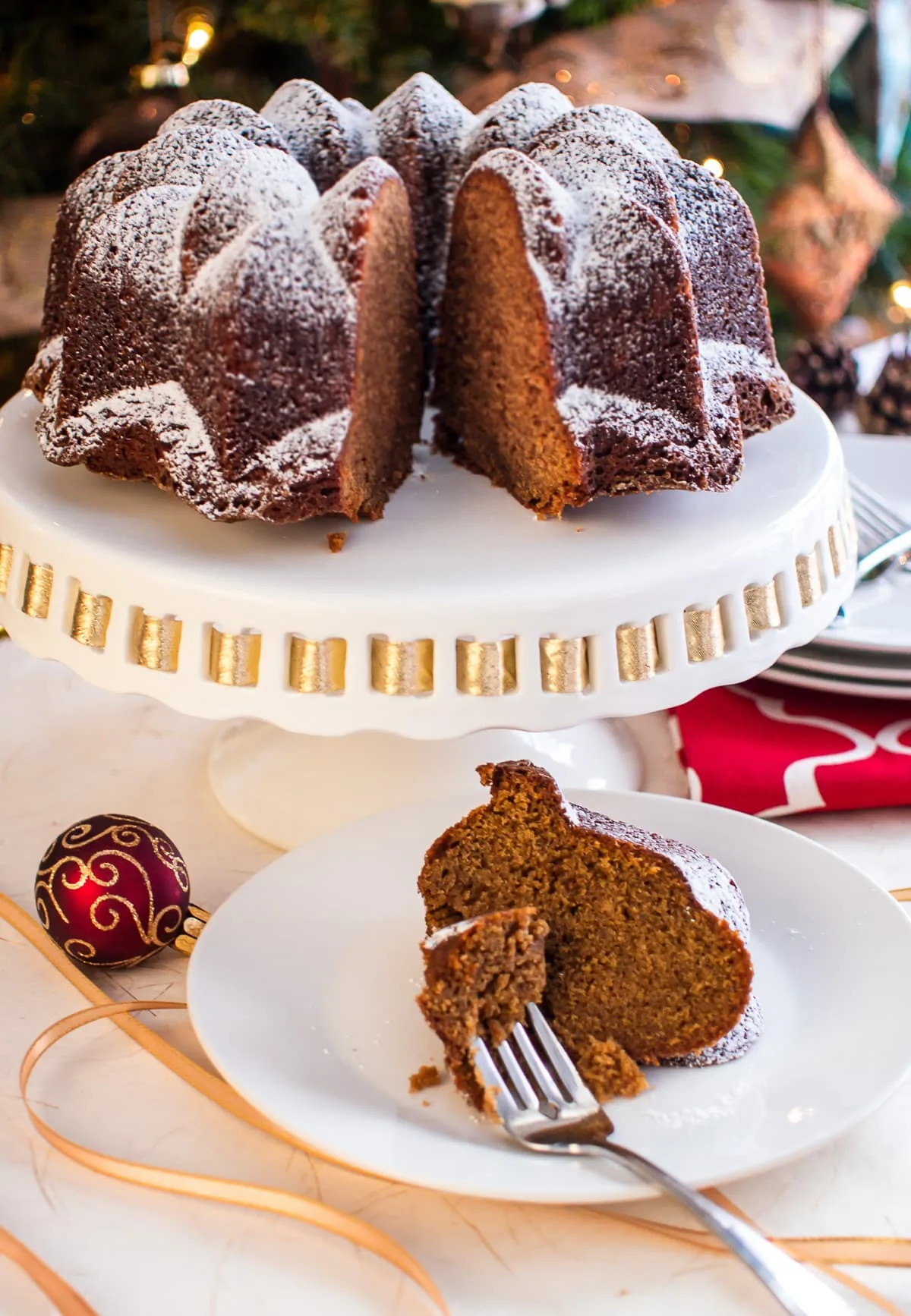 Gingerbread cake on cake stand.