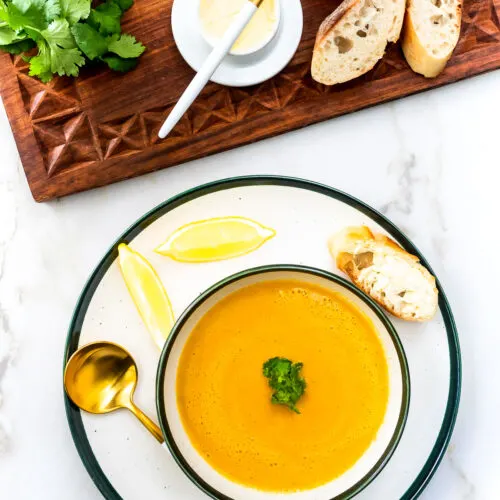 Bowl of creamy red lentil and cauliflower soup.