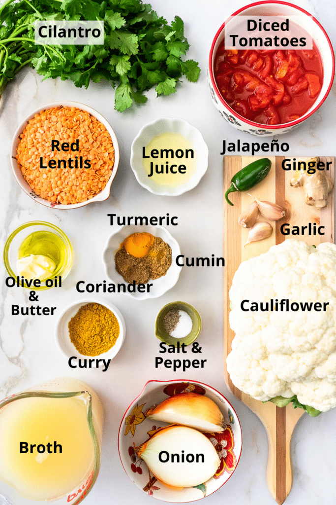 Ingredients needed to make red lentil and cauliflower soup.