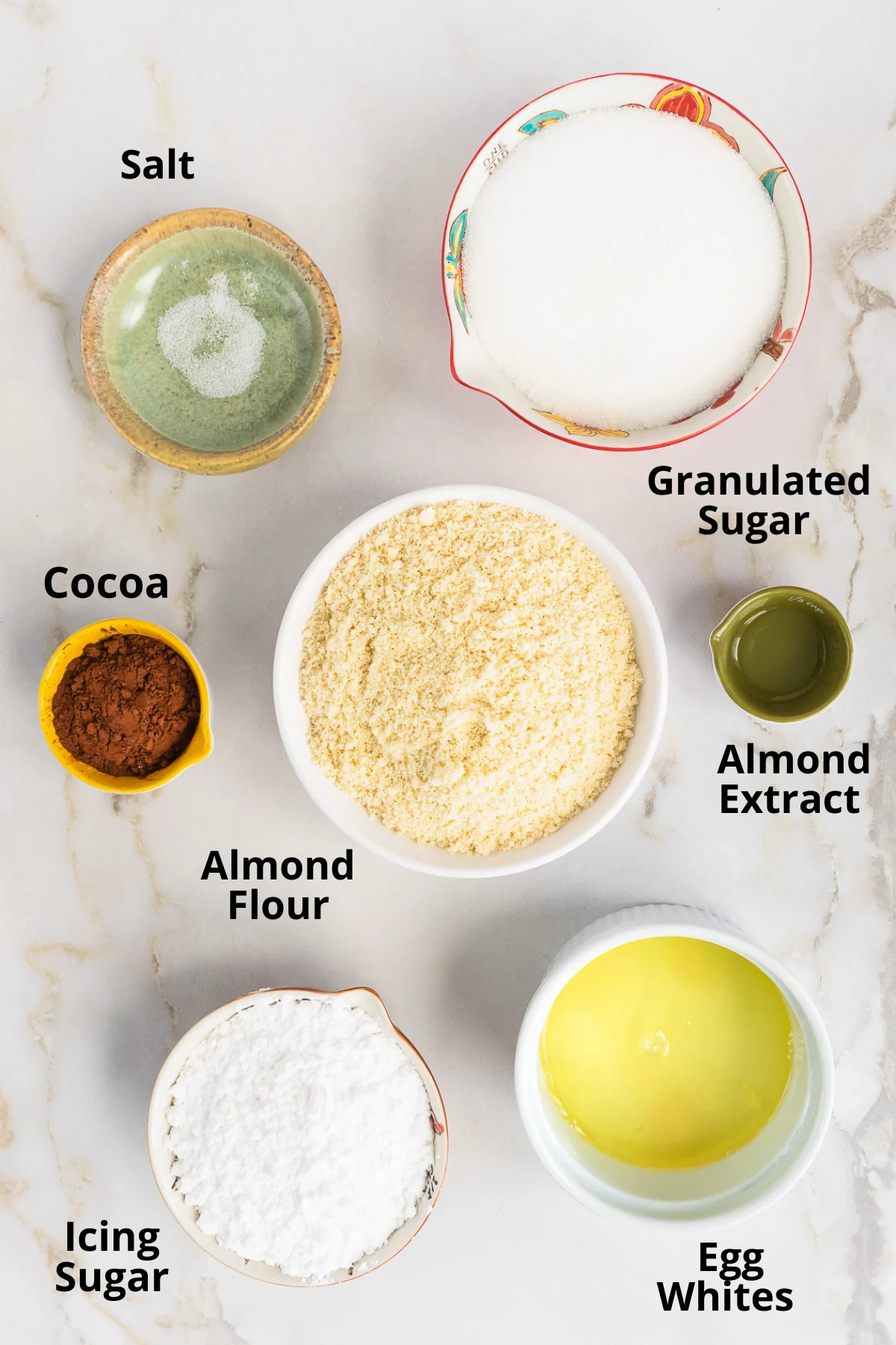 Ingredients needed to make chocolate amaretti cookies.