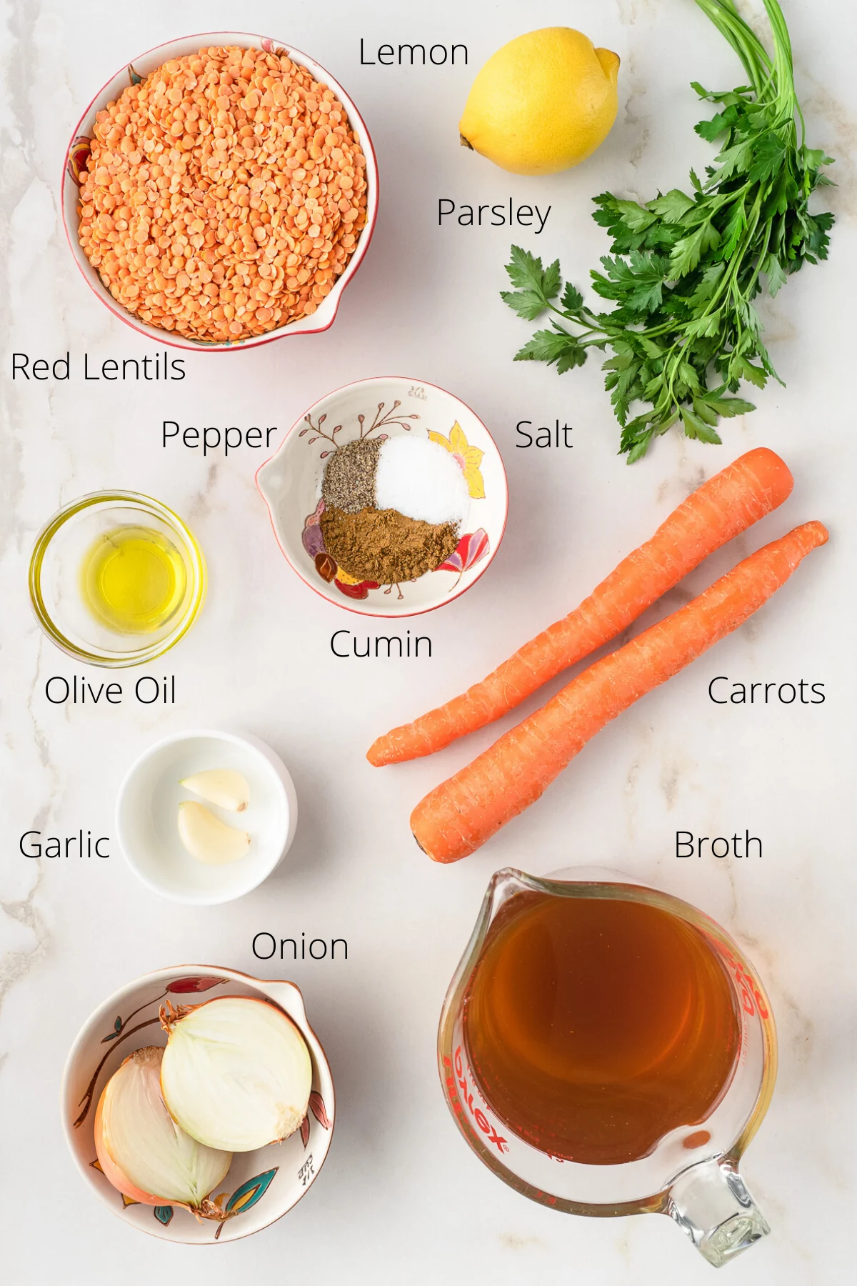Image of ingredients needed to make a red lentil soup.
