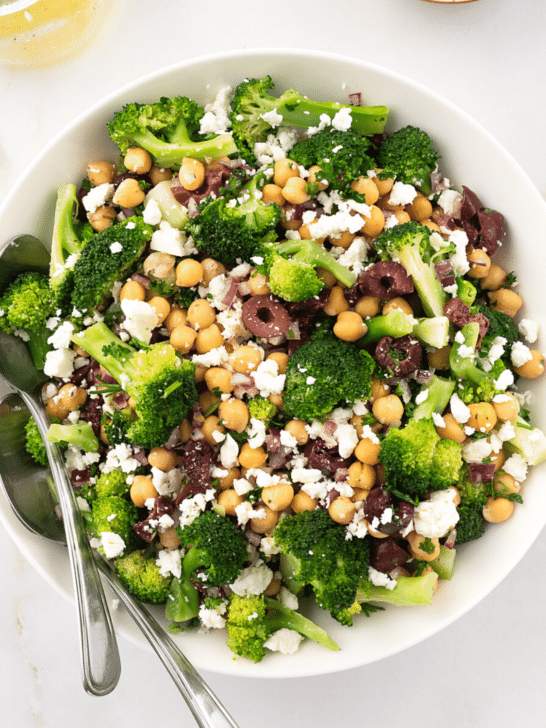 Chickpea broccoli salad in a white bowl.