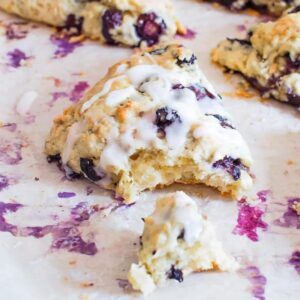 Blueberry lemon scones on baking sheet.