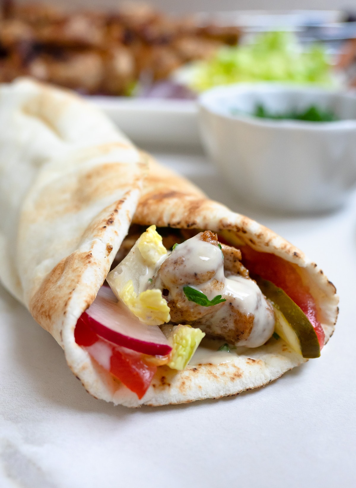 Chicken shawarma kebab pita sandwich.