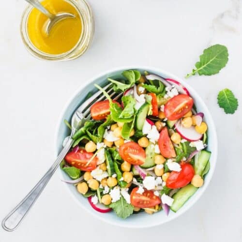 Bowl of kale and chickpea salad.