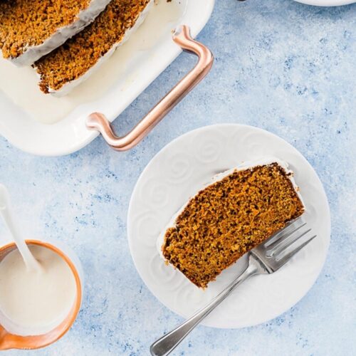 Slice of carrot bread on small dish.
