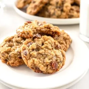 Oatmeal date cookies on white dish.