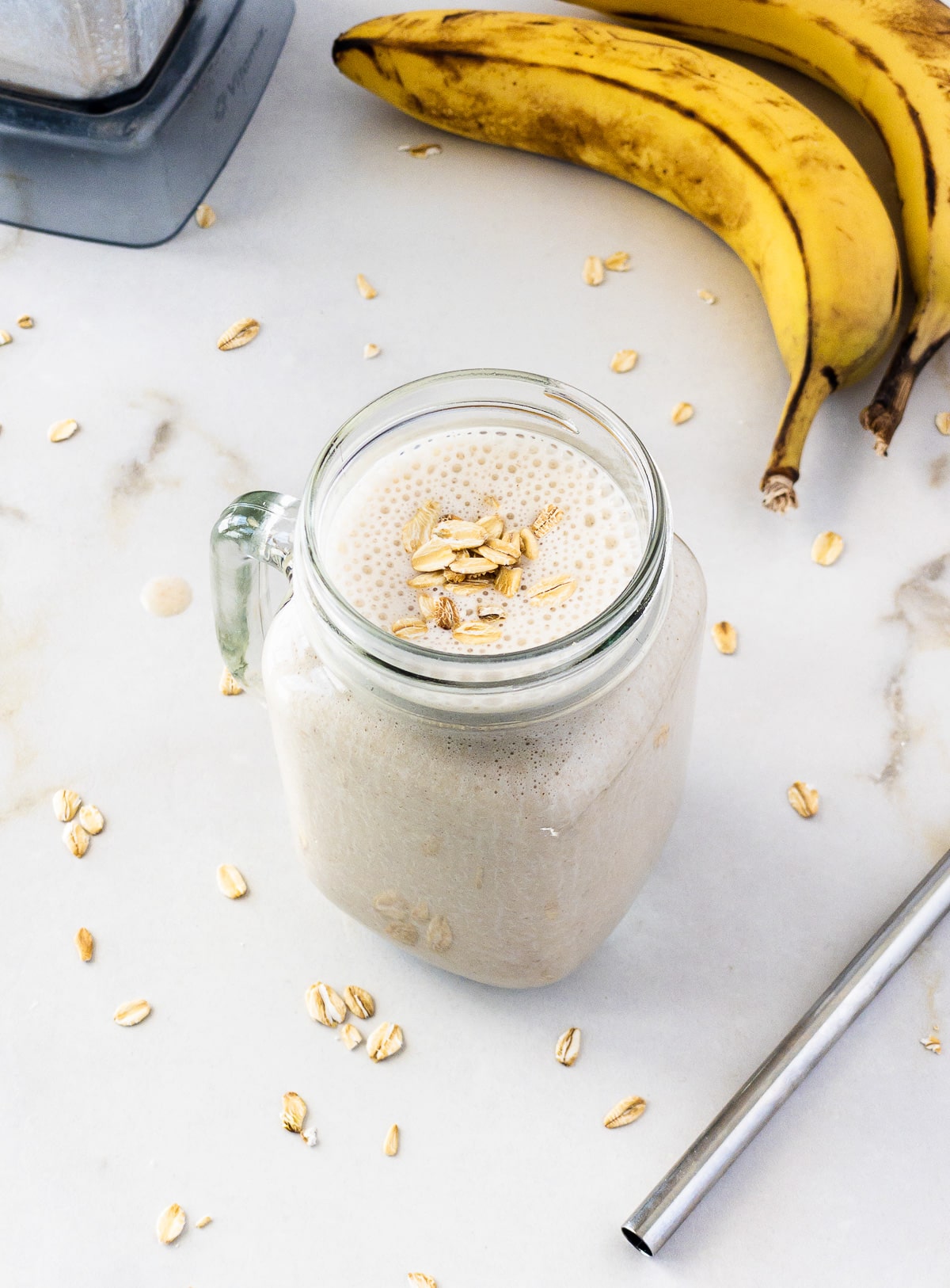 Banana oat smoothie in mason jar.