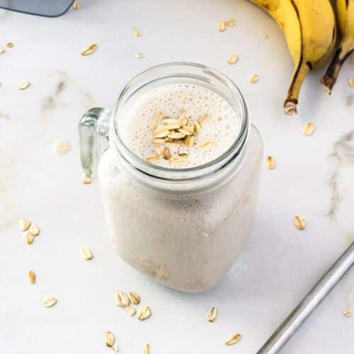 Banana oat smoothie in mason jar.