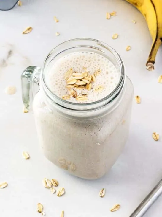 Banana oat smoothie in mason jar.