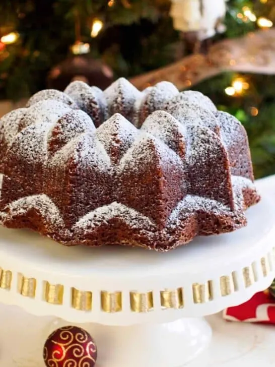 Gingerbread bundt on cake platter.