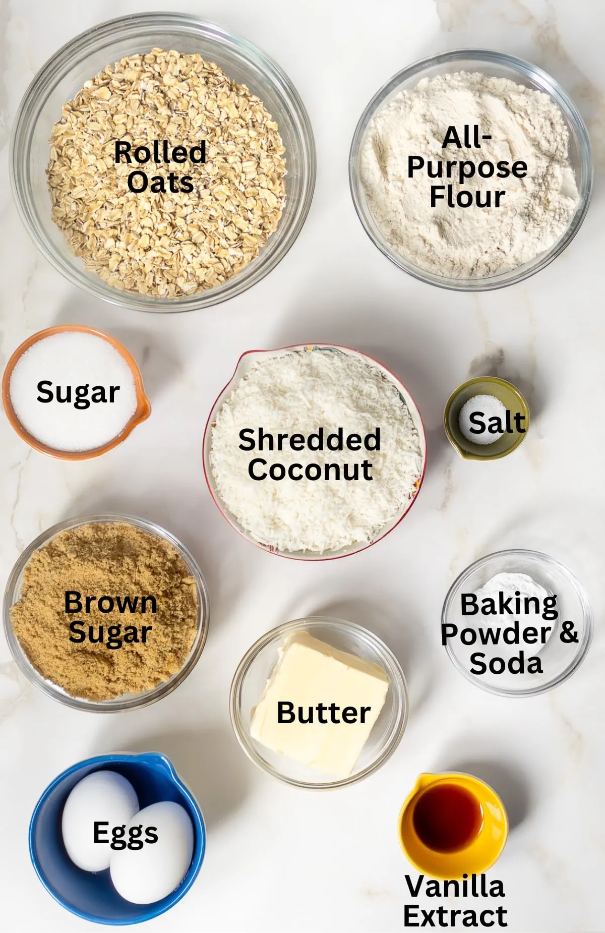 Ingredients needed to make oatmeal coconut cookies.