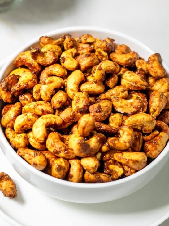 Bowl of roasted curried cashews.