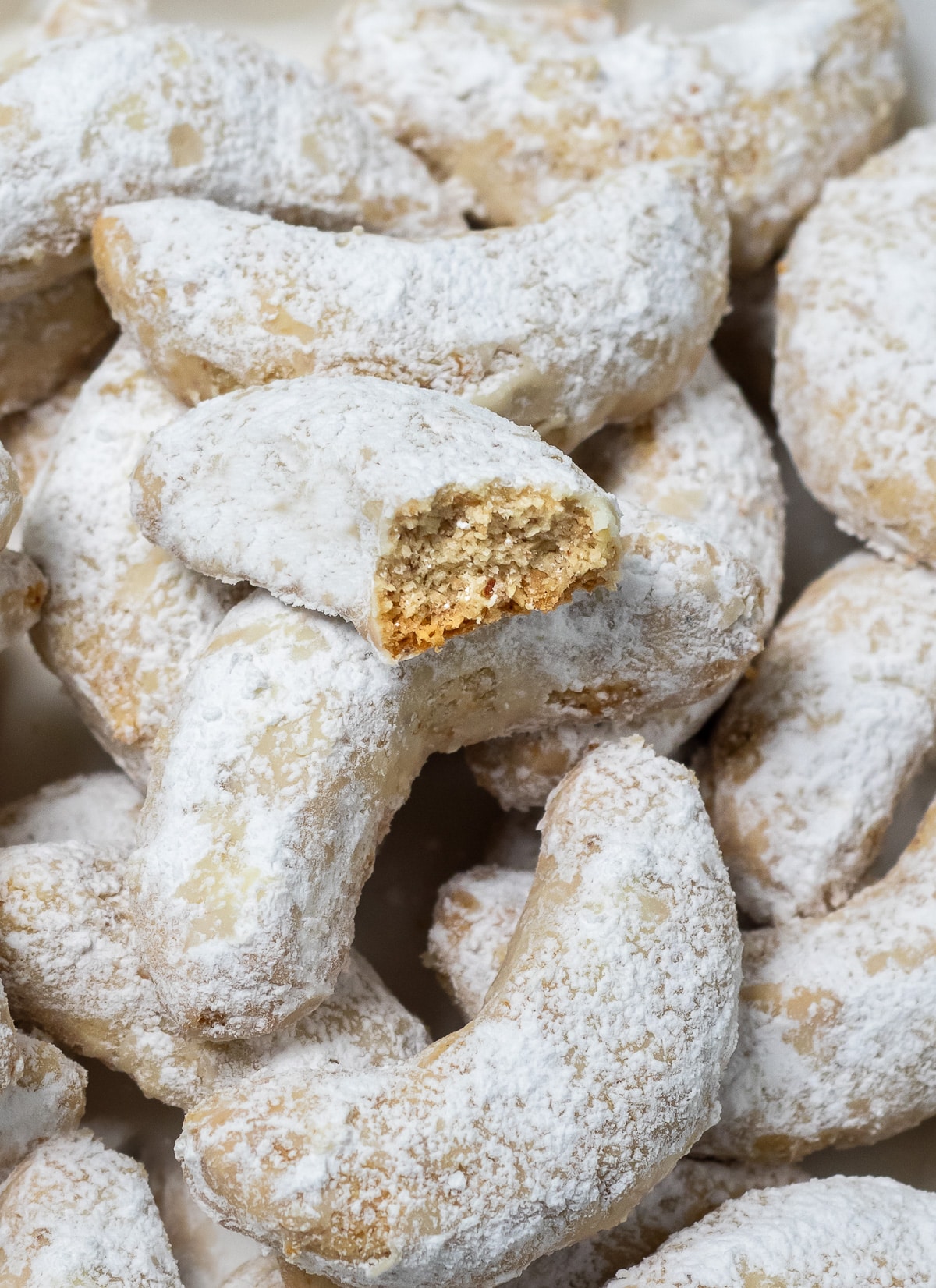 Up close shot of the inside texture of a crescent cookie.