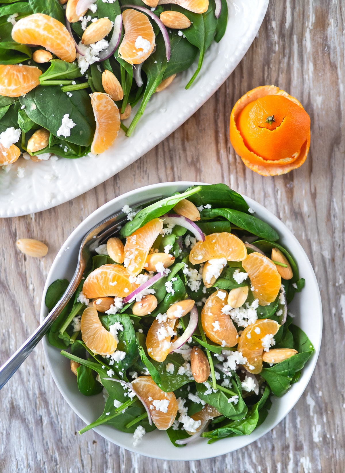 Spinach salad with clementines.