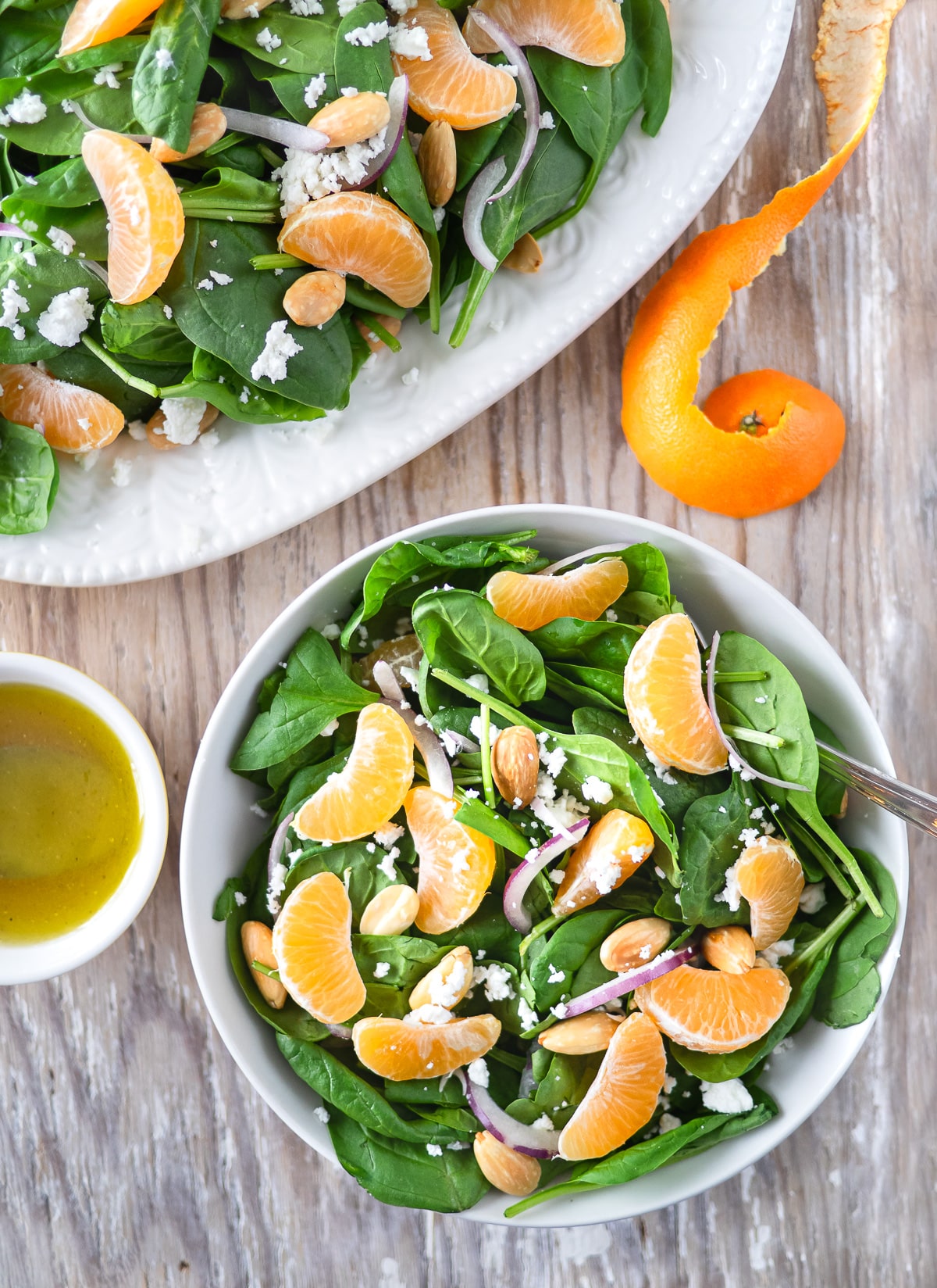 Spinach salad with clementines.
