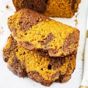 Sliced pumpkin and chocolate swirled bread.