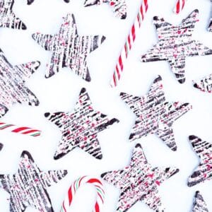 Chocolate peppermint sugar cookies drizzled with white chocolate and spinkled with crushed candy canes.