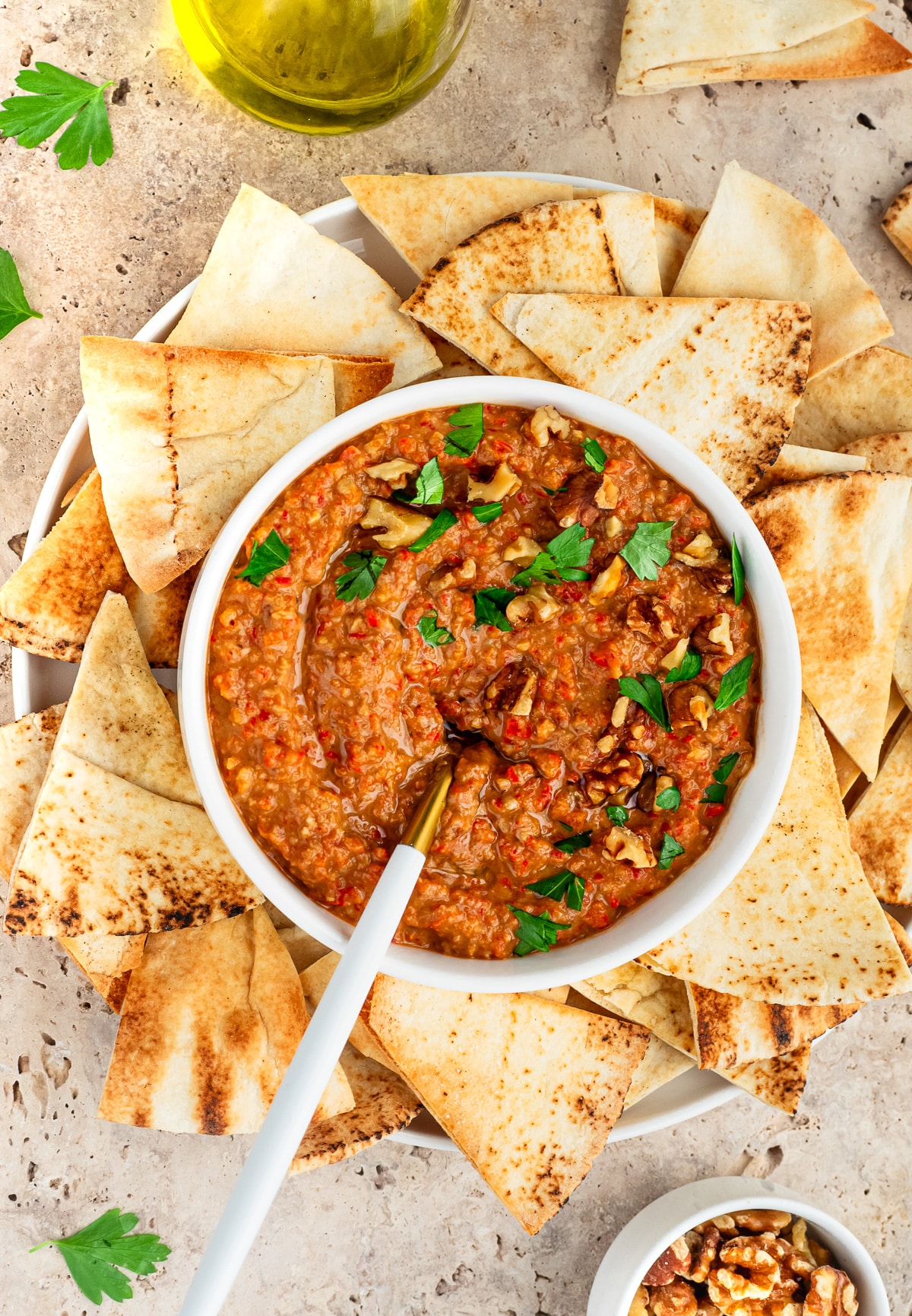 Bowl of M'hammara served with Pita chips.