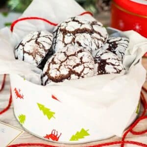 Chocolate crinkle cookies in cookie tin.