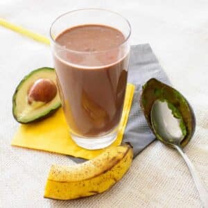 Glass of avocado chocolate smoothie.