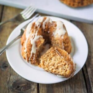 Mini apple bundt cake on small dish.