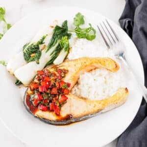 Thai salmon steak served cilantro chili sauce.